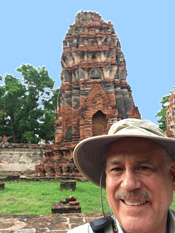Stephen Cervantes by a wat in Thailand